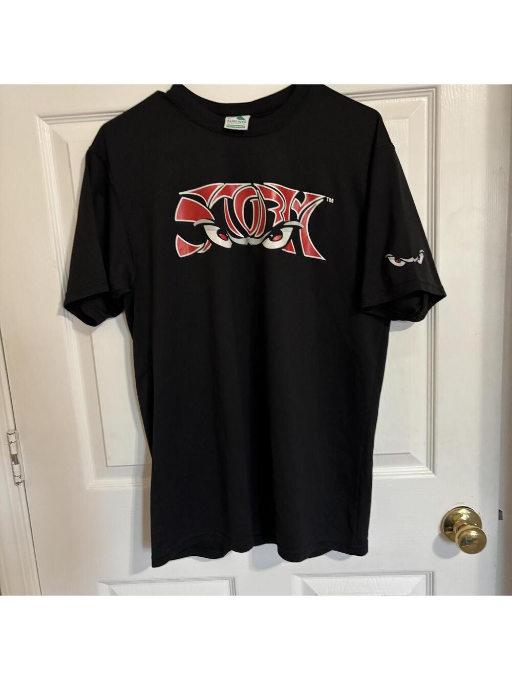 Storm #35 Black Graphic T-Shirt with Red and White Logo size Medium